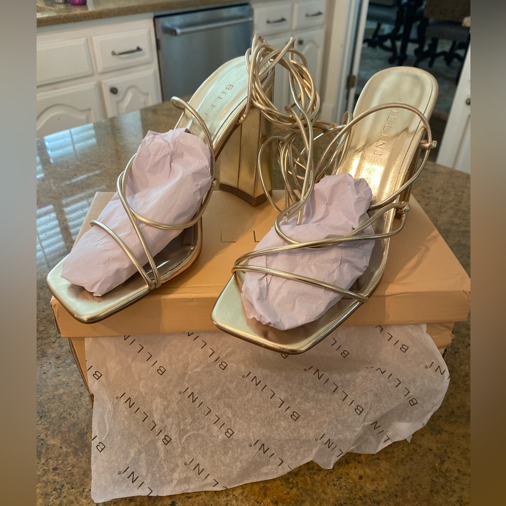 Gold wrap up heels